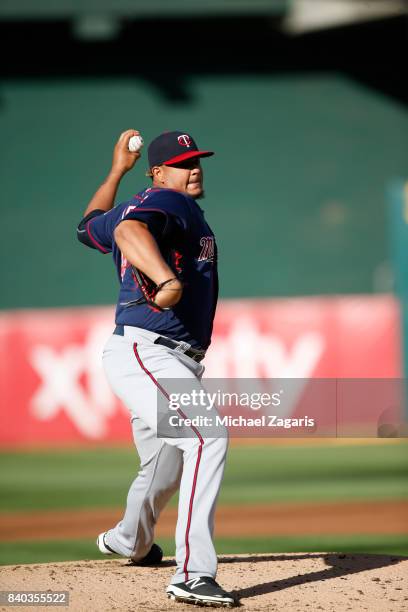 Adalberto Mejia of the Minnesota Twins pitches during the game against the Oakland Athletics at the Oakland Alameda Coliseum on July 29, 2017 in...