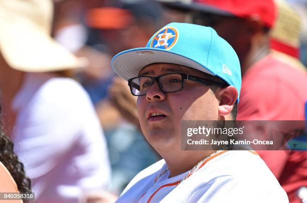 Actor Rico Rodriguez from the TV series Modern Family, attends the game between the Los Angeles Angels of Anaheim and the Houston Astros at Angel...