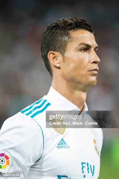 August 27: Cristiano Ronaldo of Real Madrid holds the UEFA Super Cup trophy prior to the La Liga match between Real Madrid and Valencia C.F. At the...