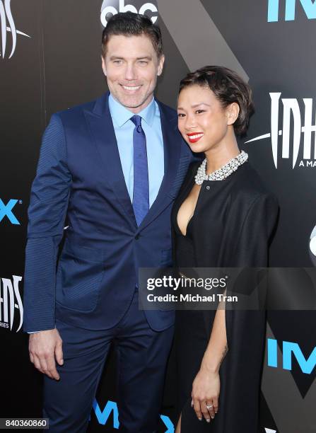 Anson Mount and Darah Trang arrive at the Los Angeles premiere of ABC and Marvel's "Inhumans" held at Universal CityWalk on August 28, 2017 in...