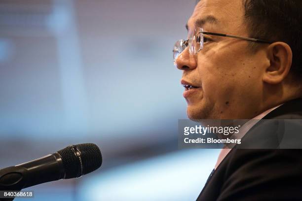 Billionaire Wang Chuanfu, chairman of BYD Co., speaks during a news conference in Hong Kong, China, on Tuesday, Aug. 29, 2017. China's plan to wean...