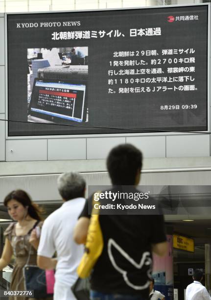 Display near JR Osaka Station reports on the Aug. 29 launch of a North Korean ballistic missile that fell into the Pacific Ocean off Japan's...