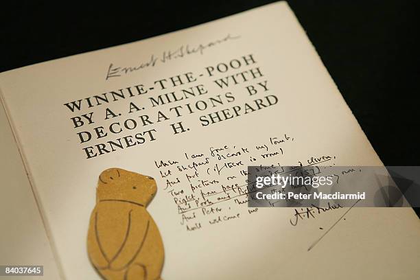 Rare Winnie-the-Pooh book showing an inscription from author A.A. Milne asking for artist E.H. Shephard to decorate his tomb is displayed at a press...