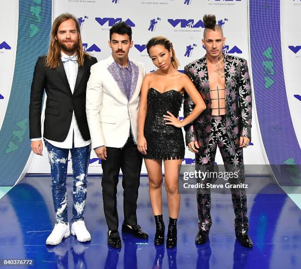 Jack Lawless, Joe Jonas, JinJoo Lee and Cole Whittle of DNCE arrive at the 2017 MTV Video Music Awards at The Forum on August 27, 2017 in Inglewood,...
