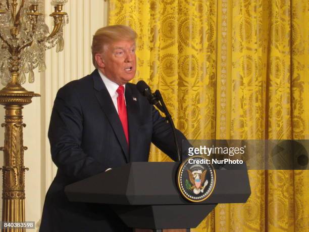 President Donald Trump answers a question during a joint press conference with Finnish President Sauli Niinistö holds on August 28 at the White House...