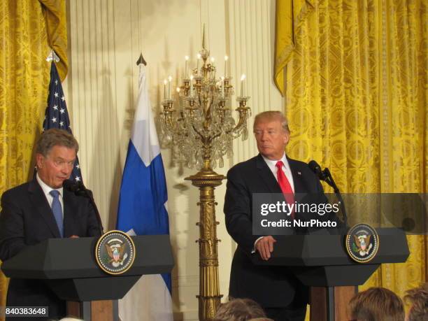 President Donald Trump and President Sauli Niinisto of Finland participate in a joint news conference at the East Room of the White House August 28,...