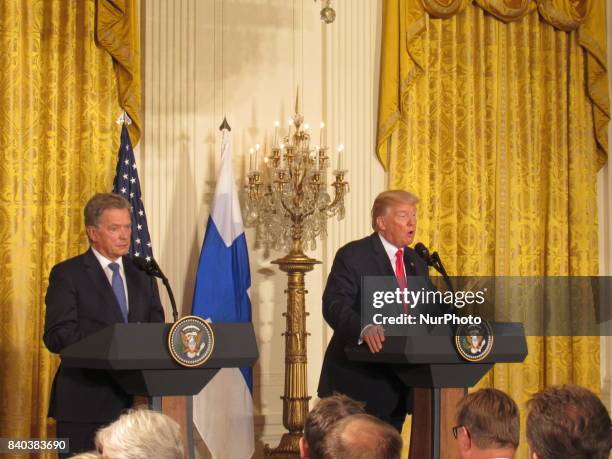 President Donald Trump and President Sauli Niinisto of Finland participate in a joint news conference at the East Room of the White House August 28,...