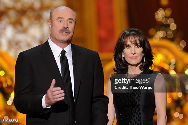 Dr. Phil McGraw and Robin McGraw speak on stage during TNT's "Christmas in Washington 2008" at the National Building Museum on December 14, 2008 in...