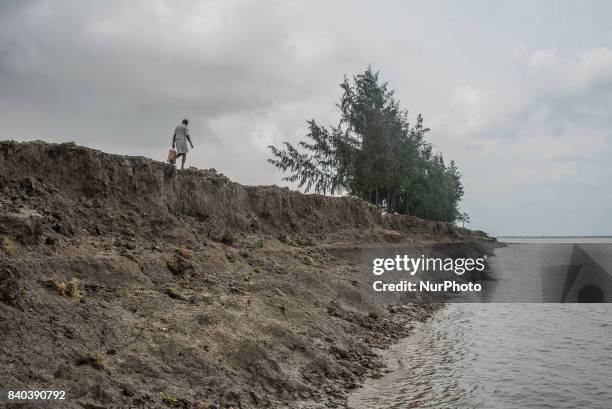 On 28 August 2017 in Ghoramara, India. Ghoramara village is fighting with the problem of breaking river banks for several years to retain its...