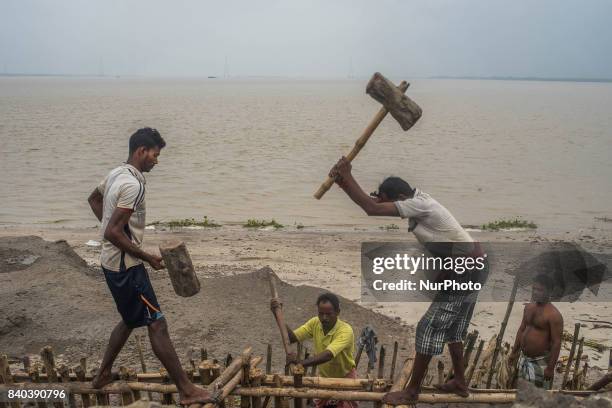 On 28 August 2017 in Ghoramara, India. The villagers try to repair the barrage every time when it breaks apart due to extensive tidal water pressure....