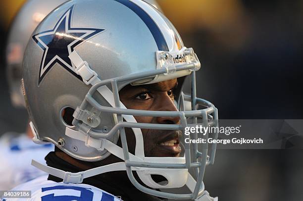 Linebacker Bradie James of the Dallas Cowboys looks on from the field during pregame warmup before a game against the Pittsburgh Steelers at Heinz...