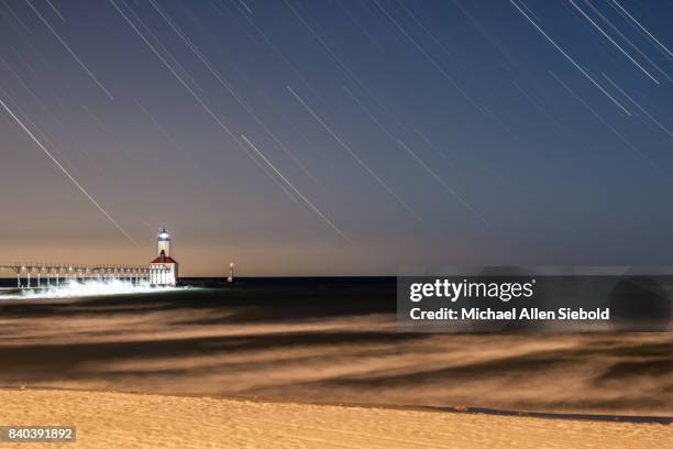 michigan city lighthouse star trail - michigan city indiana stock pictures, royalty-free photos & images