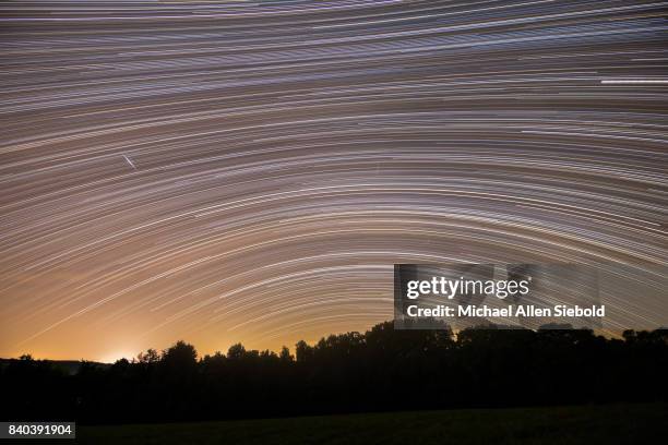 star trail facing south with iridium flares - natchez trace parkway stock pictures, royalty-free photos & images