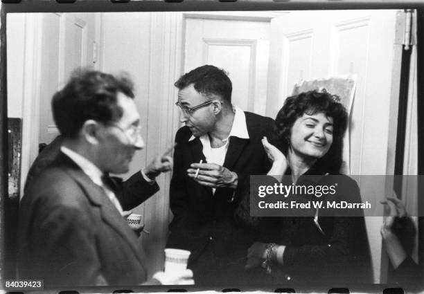 American book editor Carl Solomon stand with other, unidentified guests at a party, New York, New York, September 17, 1960. Allen Ginsberg's epic...