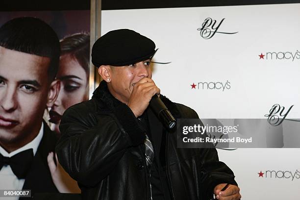 Latin rapper Daddy Yankee speaks to his fans while introducing his new fragrance, "DY", at Macy's on State Street in Chicago, Illinois on December...