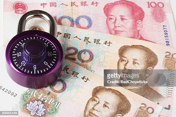 lock on chinese yuan notes - 20 yuan note stock pictures, royalty-free photos & images