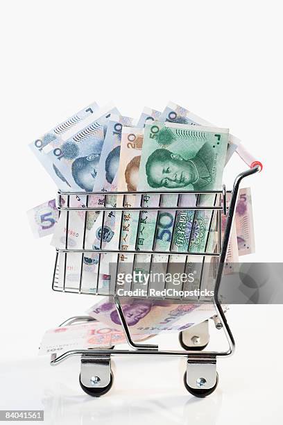 close-up of chinese currency in a shopping cart - 20 yuan note stock pictures, royalty-free photos & images