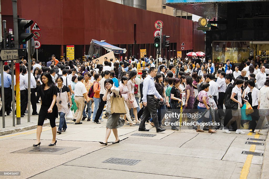 Crowd walking in a street, Hong Kong Island, Hong Kong, China