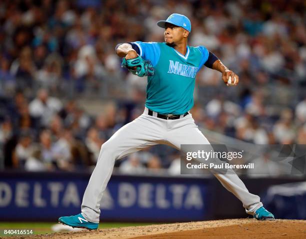 Pitcher Ariel Miranda of the Seattle Mariners pitches in an MLB baseball game against the New York Yankees on August 25, 2017 at Yankee Stadium in...