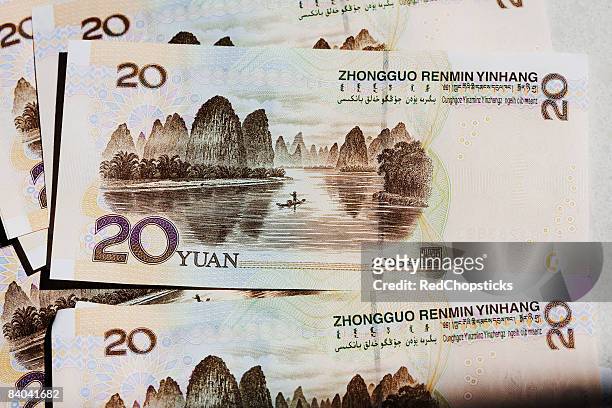 close-up of twenty yuan notes - 20 yuan note stock pictures, royalty-free photos & images