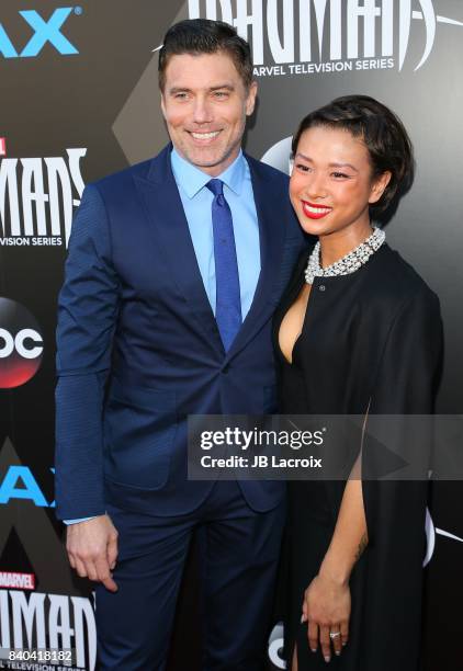 Anson Mount and Darah Trang attend the world premiere of "Inhumans" at Universal CityWalk on August 28, 2017 in Universal City California.