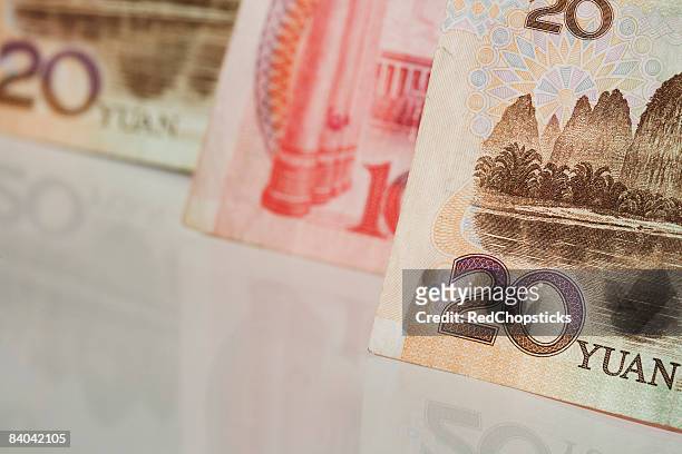 close-up of chinese yuan notes - 20 yuan note stock pictures, royalty-free photos & images