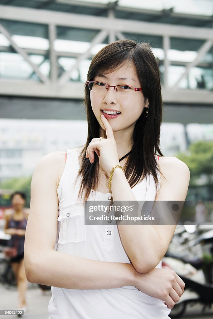 Portrait of a young woman smiling, Zhengzhou, Henan Province, China