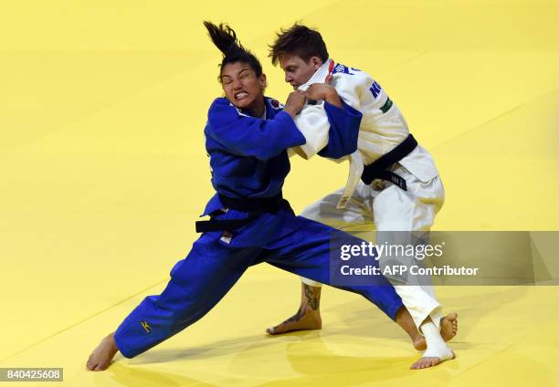 Germanys Nieke Nordmeyer competes with Brasil's Sarah Menezes during their match in the womens -52kg category at the World Judo Championships in...