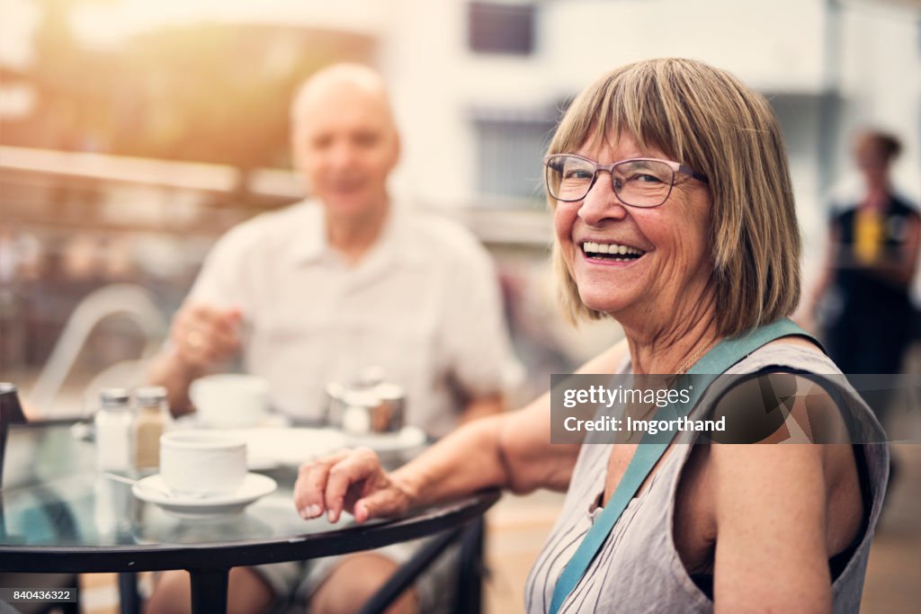 Senior couple enjoying coffee in hotel resort