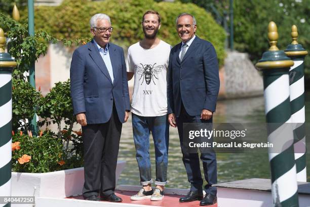 Venice Film Festival Director Alberto Barbera,Venice Festival host Alessandro Borghi and Venice Biennale President Paolo Baratta arrive at the 74th...