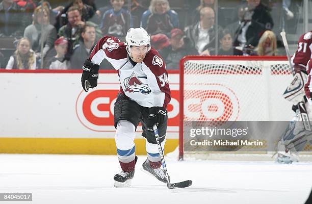 David Jones of the Colorado Avalanche skates up ice against the Chicago Blackhawks during their NHL game at the Pepsi Center on December 12, 2008 in...