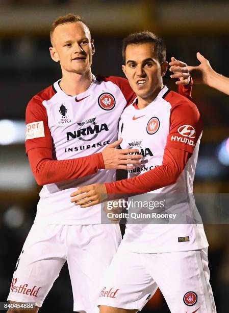 Steven Lustica of the Wanderers is congratulated by Jack Clisby after scoring a goal during the round of 16 FFA Cup match between Bentleigh Greens...