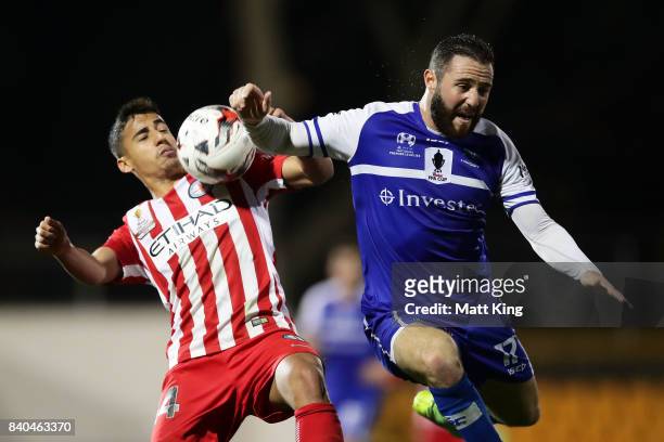Daniel Arzani of Melbourne City competes for the ball against Gideon Sweet of Hakoah during the FFA Cup round of 16 match between Hakoah Sydney City...