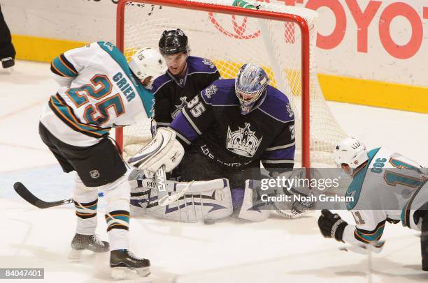 Mike Grier of the San Jose Sharks attempts a shot on goal against Jason LaBarbera of the Los Angeles Kings during the game on December 15, 2008 at...