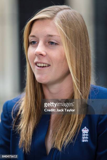England women's cricket team captain Heather Knight speaks to media before attending a reception with teammates at 10 Downing Street on August 29,...