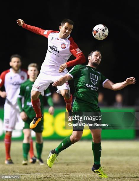 Steven Lustica of the Wanderers heads the ball over the top of Nicholas Ward of Bentleigh during the round of 16 FFA Cup match between Bentleigh...