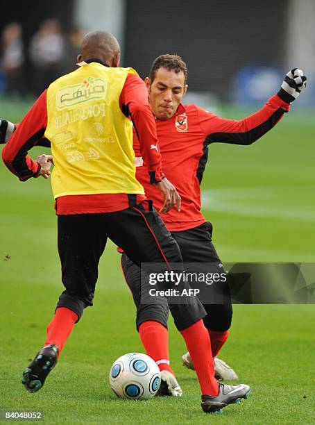 Egyptian football club team Al Ahly's forward Ahmed Belal fights for the ball during a training session at International Stadium Yokohama in Kanagawa...