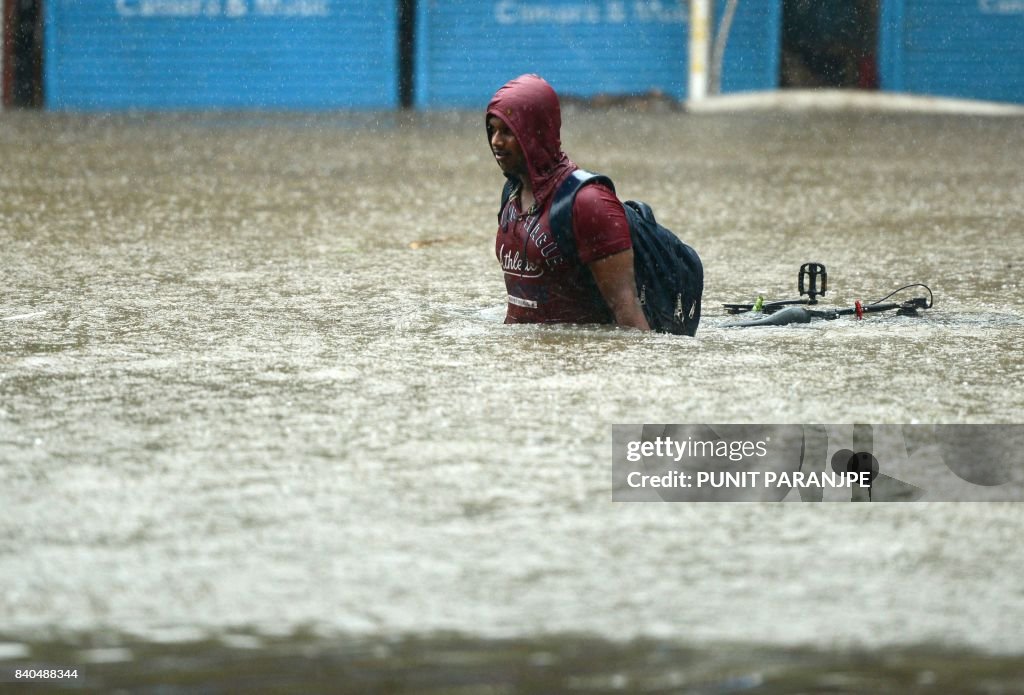 TOPSHOT-INDIA-WEATHER-FLOOD