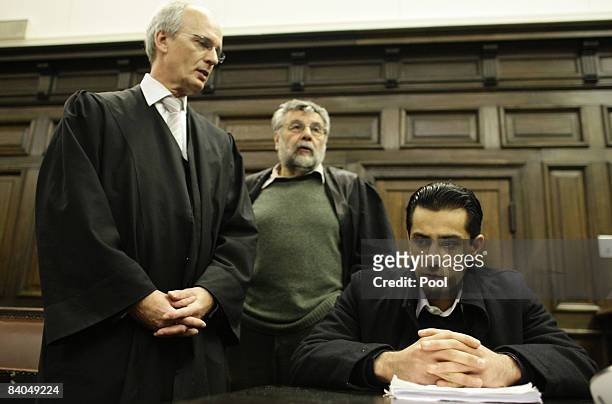 The 24-year-old German-Afghan defendant Ahmad Sobair O. Is seen with his advocates Thomas Bliwier and Peter Jacobi during the opening of his honor...
