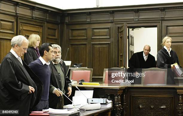 The 24-year-old German-Afghan defendant Ahmad Sobair O. Is seen with his advocates Thomas Bliwier and Peter Jacobi during the opening of his honor...