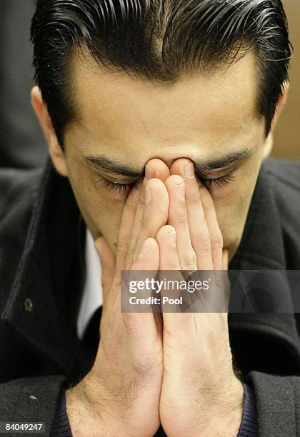 The 24-year-old German-Afghan defendant Ahmad Sobair O. Is seen during the opening of his honor killing trial at the criminal division of the Higher...