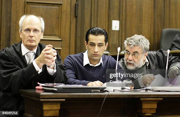 The 24-year-old German-Afghan defendant Ahmad Sobair O. Is seen with his advocates Thomas Bliwier and Peter Jacobi during the opening of his honor...