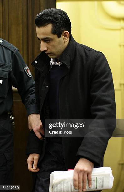 The 24-year-old German-Afghan defendant Ahmad Sobair O. Is seen during the opening of his honor killing trial at the criminal division of the Higher...