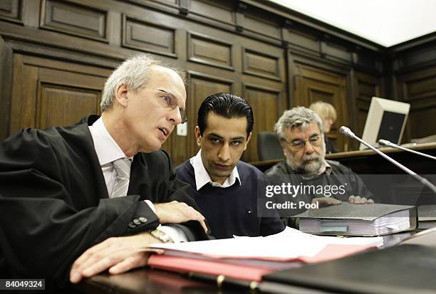 The 24-year-old German-Afghan defendant Ahmad Sobair O. Is seen with his advocates Thomas Bliwier and Peter Jacobi during the opening of his honor...