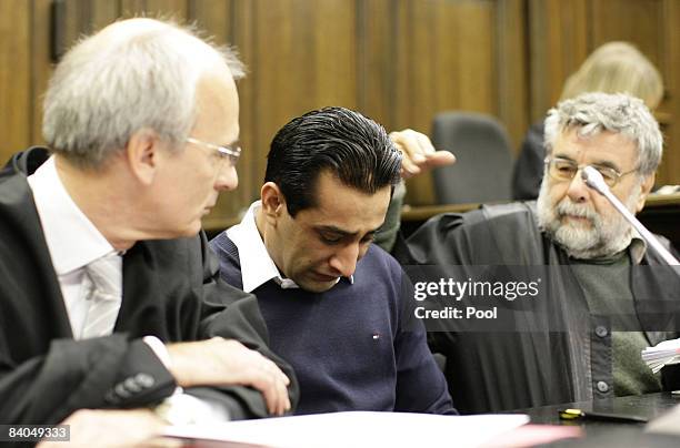 The 24-year-old German-Afghan defendant Ahmad Sobair O. Is seen with his advocates Thomas Bliwier and Peter Jacobi during the opening of his honor...