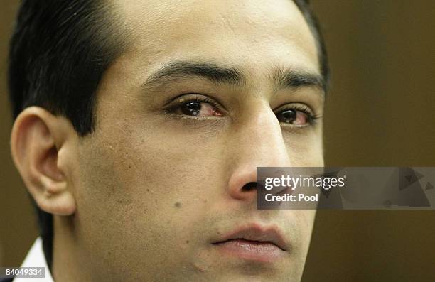 The 24-year-old German-Afghan defendant Ahmad Sobair O. Is seen during the opening of his honor killing trial at the criminal division of the Higher...