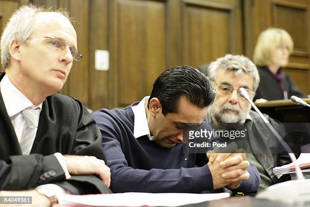 The 24-year-old German-Afghan defendant Ahmad Sobair O. Is seen with his advocates Thomas Bliwier and Peter Jacobi during the opening of his honor...