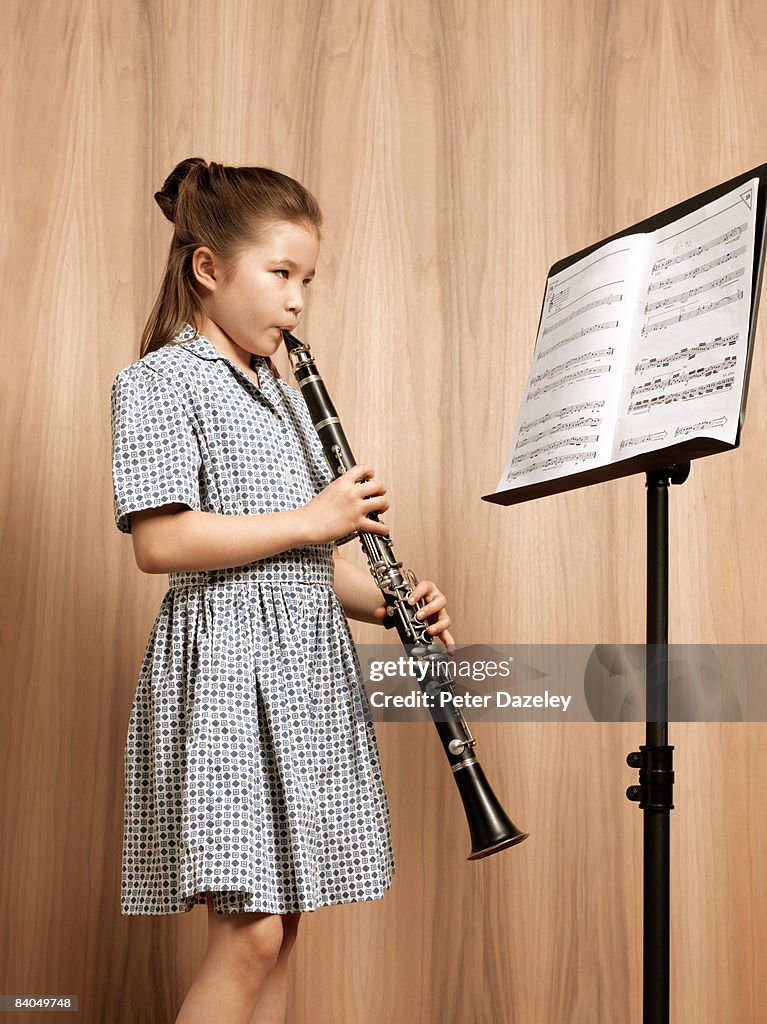 Young girl playing clarinet