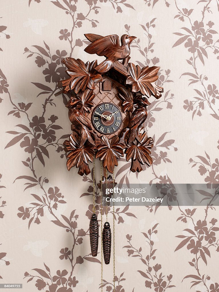 Cuckcoo clock on wall papered wall 