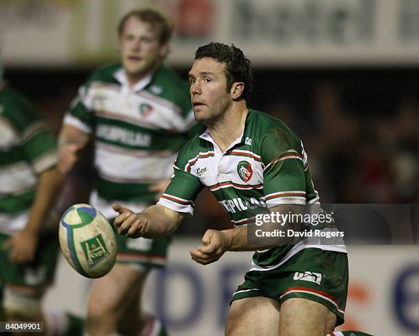 Aaron Mauger of Leicester passes the ball during the Heineken Cup match between Perpignan and Leicester Tigers at Stade Aime Giral on December 14,...